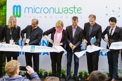 Ribbon cutting ceremony at the Micron Waste Innovation Centre official opening (left to right: Karen Lauriston, Micron VP Corporate; Dr. Bob Bhushan, Micron Chief Technology Officer; Hon. Carla Qualtrough, Minister for Public Services and Procurement; Cam Battley, CCO, Aurora Cannabis and Micron Board Member; Alfred Wong, Micron President & CEO) (CNW Group/Micron Waste Technologies Inc.)